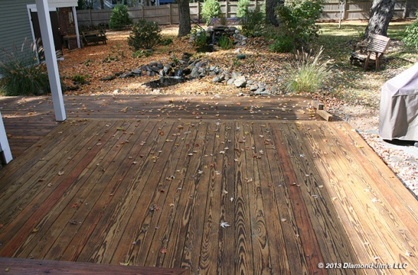 Another view of the deck one day later after the oil has sunk in.